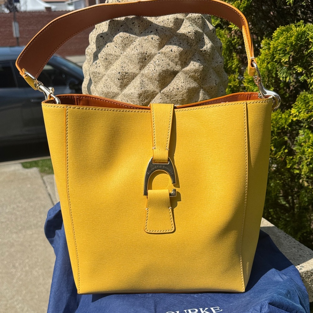 NWOT’s Dooney & Bourke Yellow Saffiano Leather Bucket Bag with detachable pouch